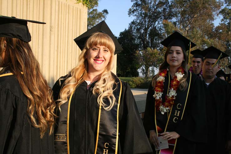 Students on walkway at Commencement