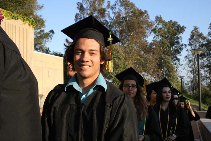 Students on walkway at Commencement