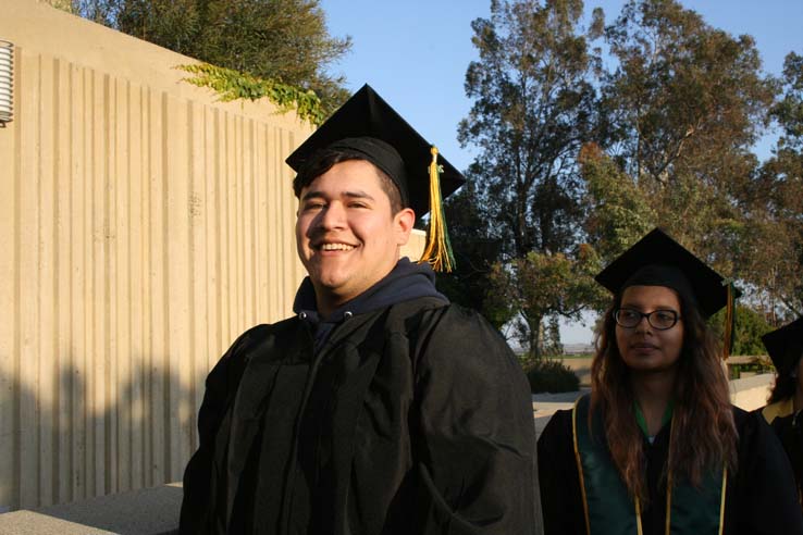 Students on walkway at Commencement