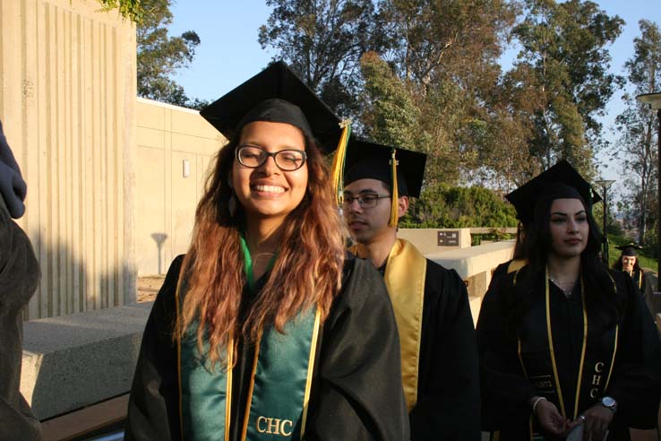 Students on walkway at Commencement