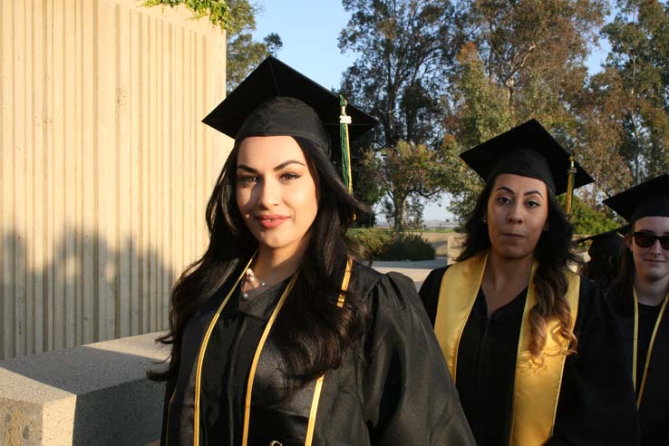 Students on walkway at Commencement