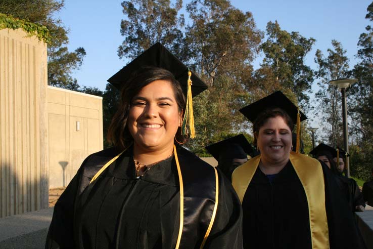 Students on walkway at Commencement