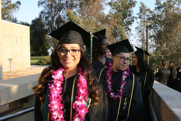 Students on walkway at Commencement