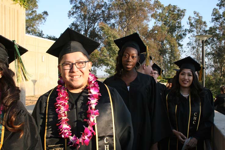 Students on walkway at Commencement