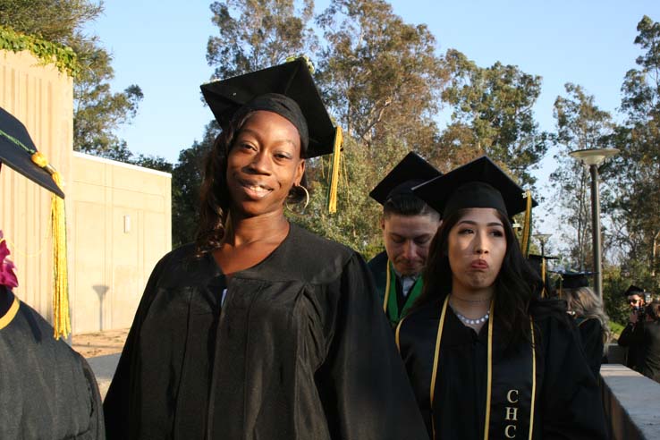 Students on walkway at Commencement