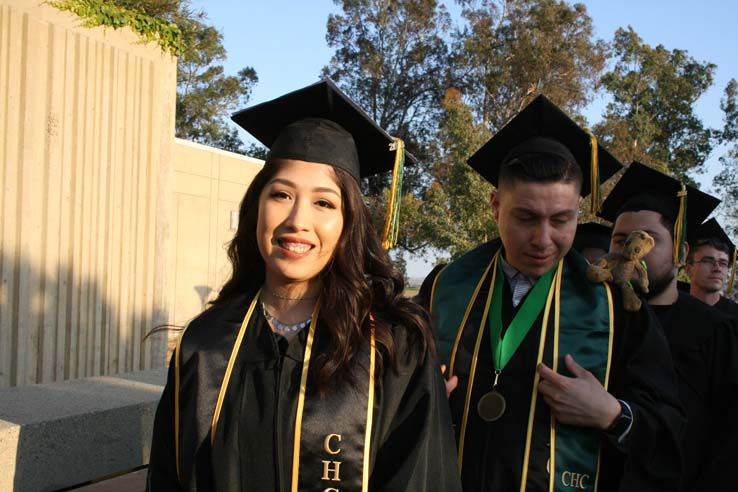 Students on walkway at Commencement