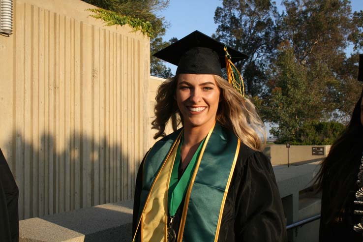 Students on walkway at Commencement