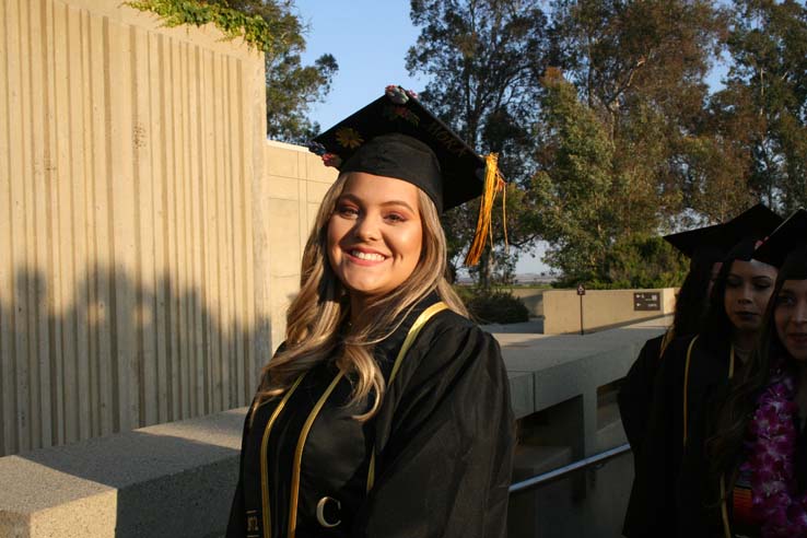 Students on walkway at Commencement