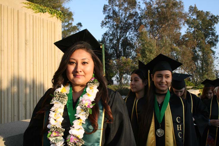 Students on walkway at Commencement