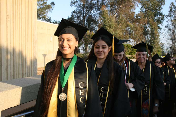 Students on walkway at Commencement