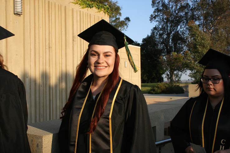 Students on walkway at Commencement