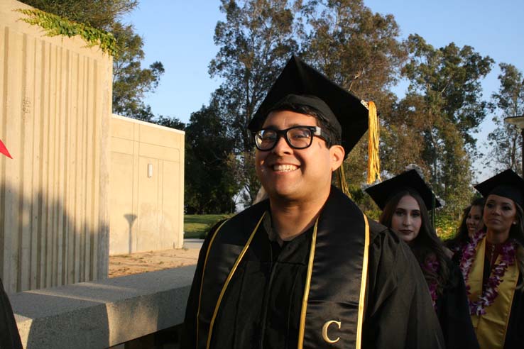 Students on walkway at Commencement