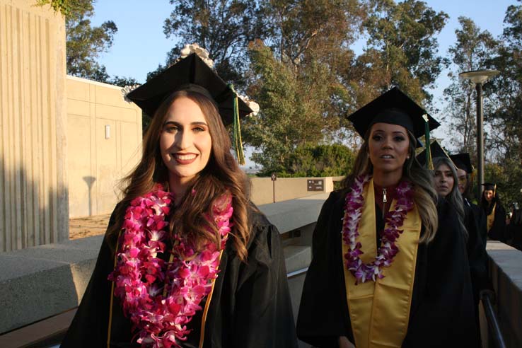 Students on walkway at Commencement