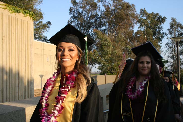 Students on walkway at Commencement