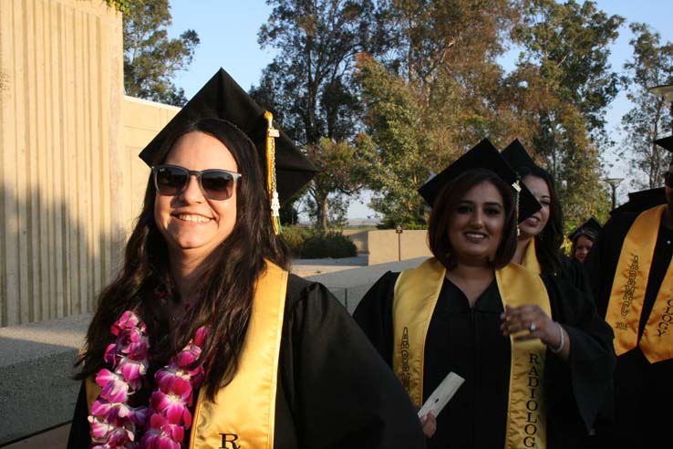 Students on walkway at Commencement