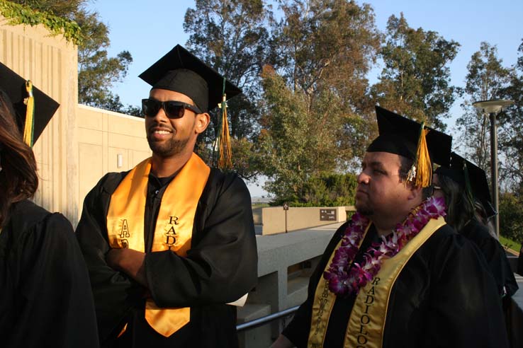 Students on walkway at Commencement