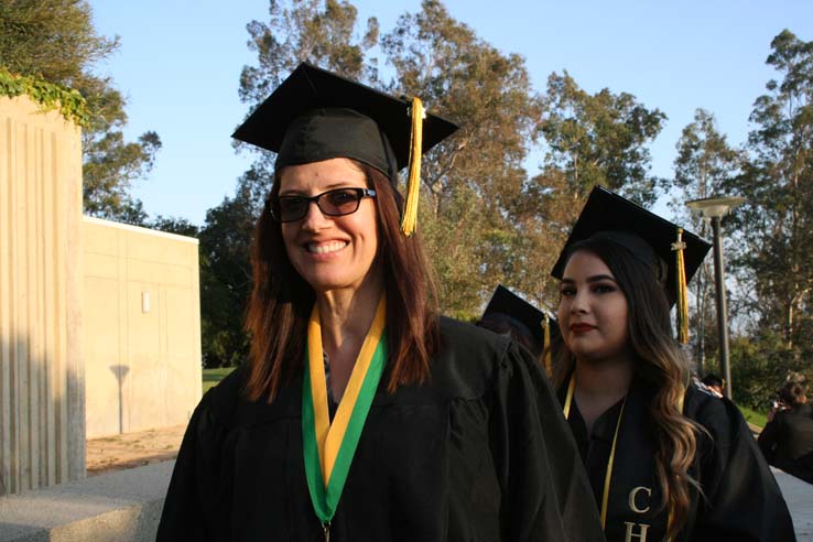 Students on walkway at Commencement