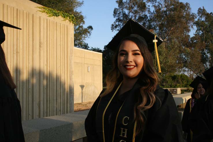 Students on walkway at Commencement