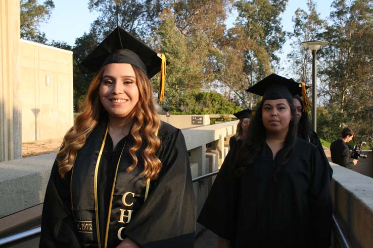 Students on walkway at Commencement