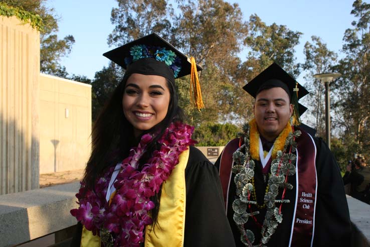 Students on walkway at Commencement