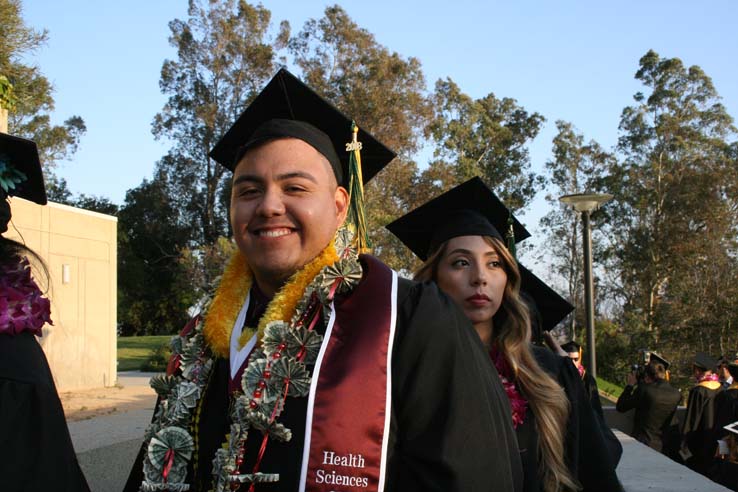 Students on walkway at Commencement