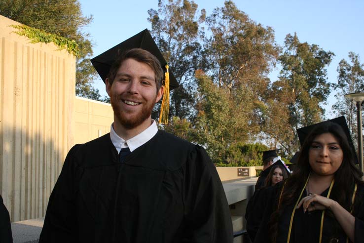 Students on walkway at Commencement