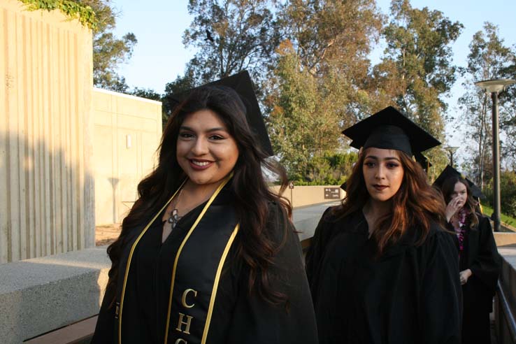 Students on walkway at Commencement