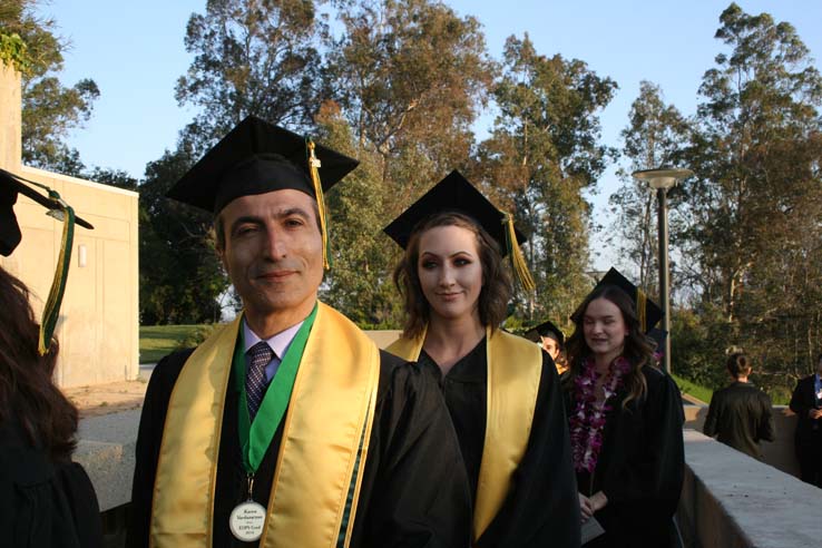 Students on walkway at Commencement