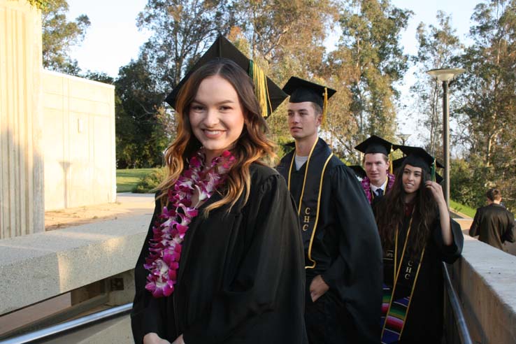 Students on walkway at Commencement