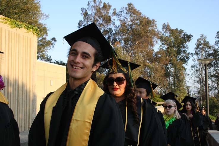 Students on walkway at Commencement