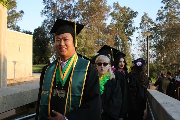 Students on walkway at Commencement