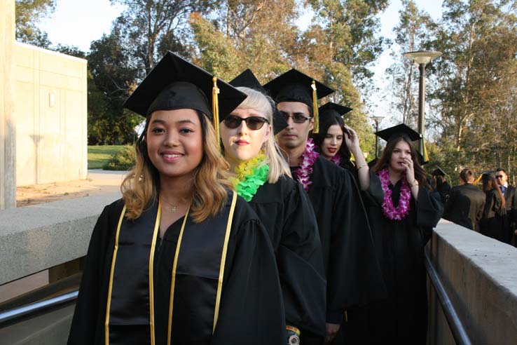 Students on walkway at Commencement