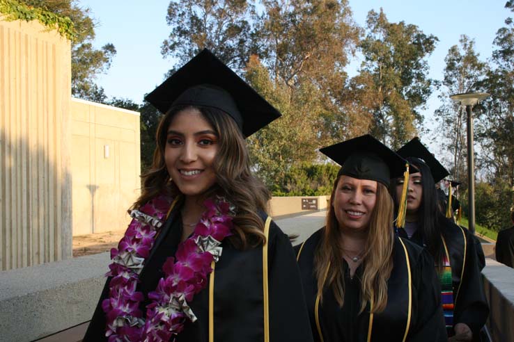 Students on walkway at Commencement