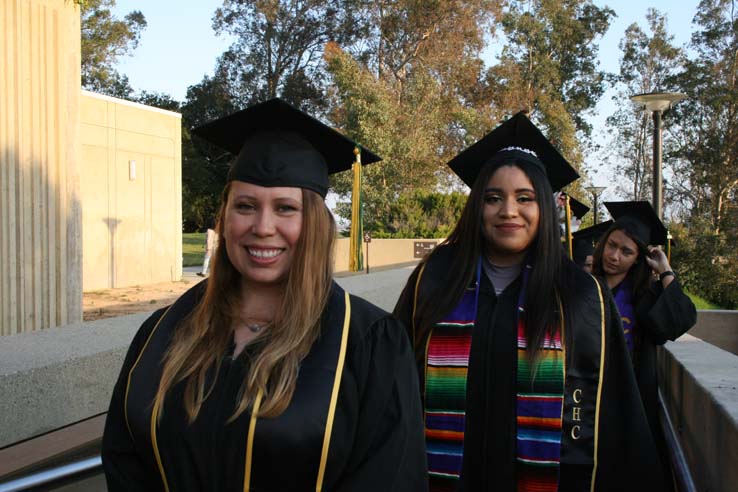 Students on walkway at Commencement