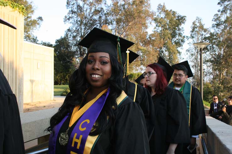 Students on walkway at Commencement