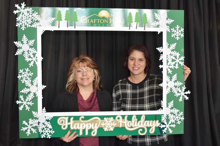 People enjoying the holiday reception