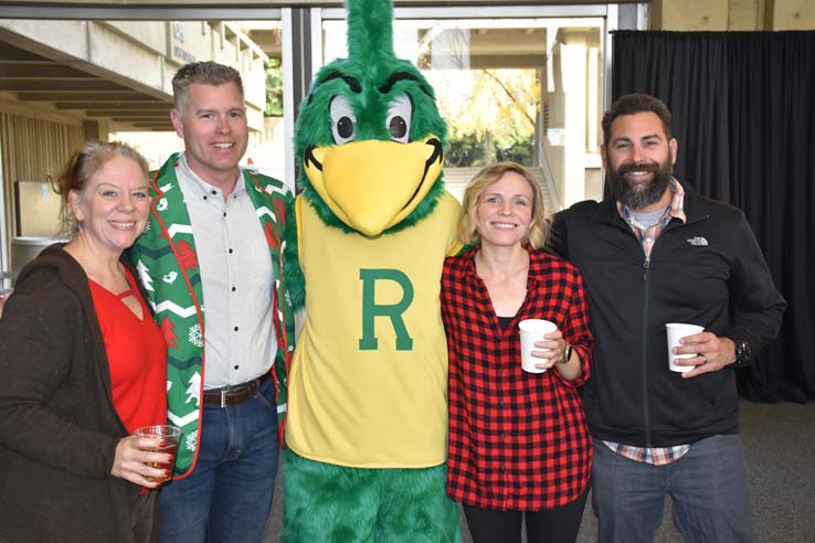 People enjoying the holiday reception