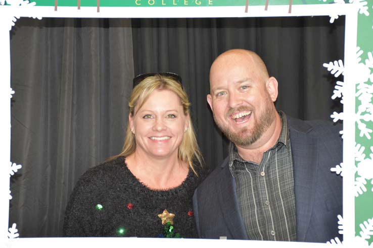 People enjoying the holiday reception