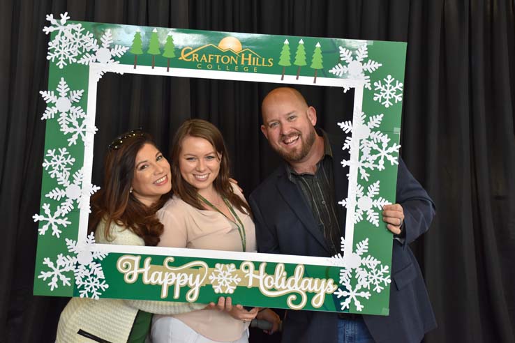 People enjoying the holiday reception