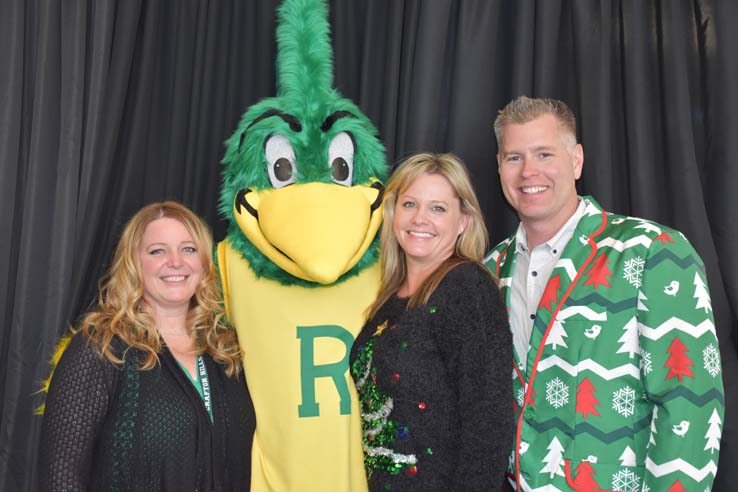 People enjoying the holiday reception