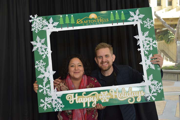 People enjoying the holiday reception