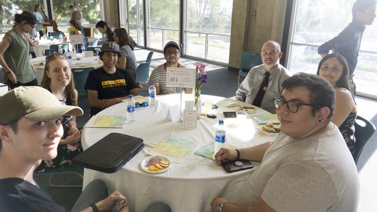 People enjoying the Scholarship Donor/Recipient Reception