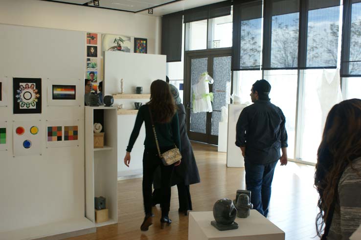People enjoying the Student Art Exhibit