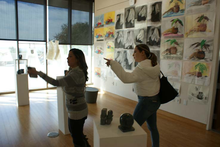 People enjoying the Student Art Exhibit