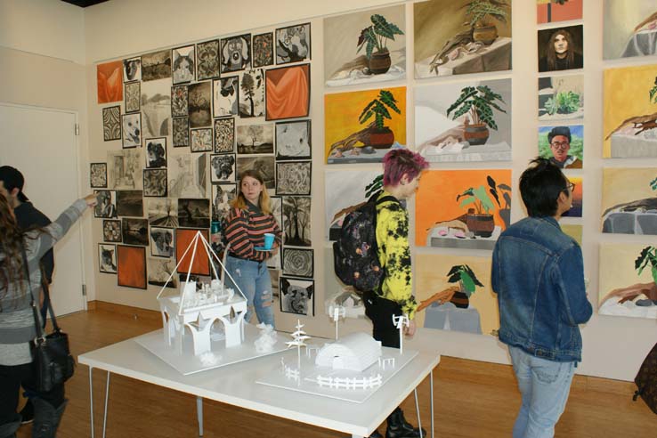 People enjoying the Student Art Exhibit