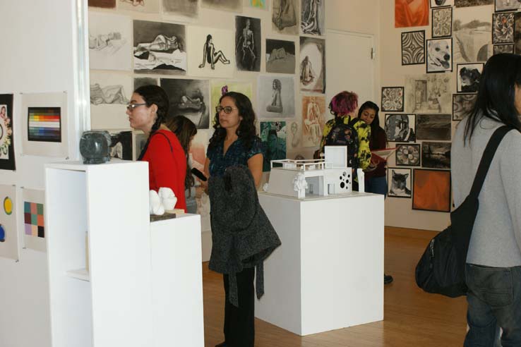 People enjoying the Student Art Exhibit