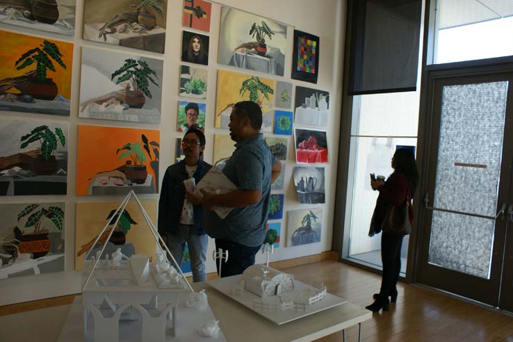 People enjoying the Student Art Exhibit