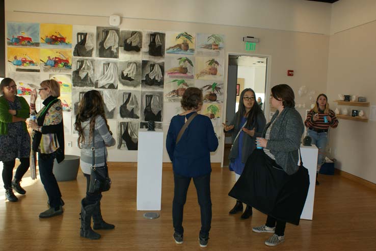 People enjoying the Student Art Exhibit