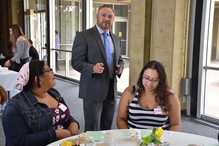 People enjoying Tea With the Deans