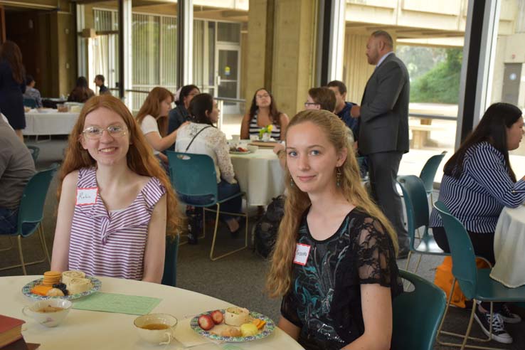 People enjoying Tea With the Deans